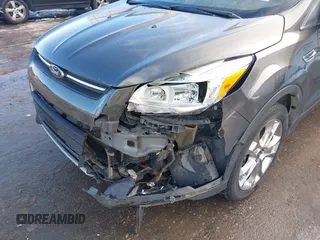 2015 Ford Escape SE with VIN 1FMCU9G98FUA70885, listed as a IAAI auction lot 41608240 with 54,802 mi miles. Bid and sale history available at carsss.com. Image 6.