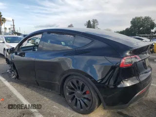 2022 Tesla Model Y Performance with VIN 7SAYGDEF9NF455508, listed as a Copart auction lot 51517205 with Not provided miles and Salvage title. Bid and sale history available at DreamBid. Image 2.