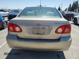 2005 Toyota Corolla CE with VIN 1NXBR32E65Z435061, listed as a Copart auction lot 55148175 with 58,673 mi miles and Salvage Title. Bid and sale history available at DreamBid. Image 6.