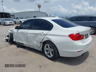 2013 BMW 3 Series 320i with VIN WBA3B1C50DK129576, listed as a IAAI auction lot 42393038 with 160,370 mi miles and . Bid and sale history available at DreamBid. Image 3.