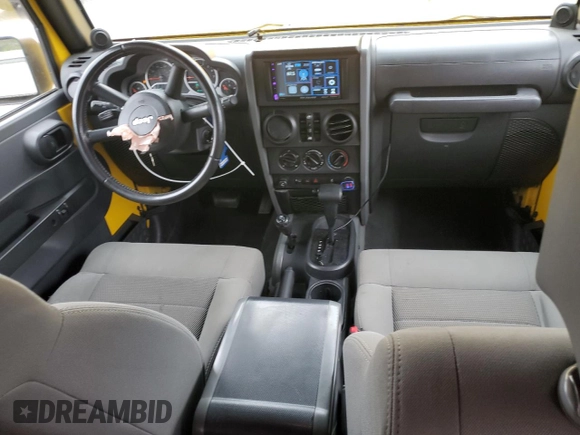 2009 Jeep Wrangler Unlimited Rubicon with VIN 1J8GA69109L761089, listed as a Copart auction lot 57975985 with 195,530 mi miles and Salvage title. Bid and sale history available at DreamBid. Image 8.