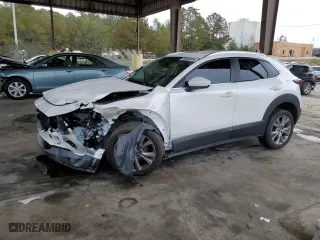 2022 Mazda CX-30 2.5 S Carbon Edition with VIN 3MVDMBCL1NM431893, listed as a Copart auction lot 79393504 with 41,144 mi miles and Salvage Title. Bid and sale history available at carsss.com. Image 1.