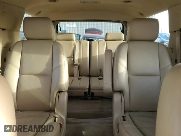 2013 Chevrolet Tahoe LTZ with VIN 1GNSCCE08DR102648, listed as a Copart auction lot 49677345 with 226,528 mi miles and Salvage title. Bid and sale history available at DreamBid. Image 10.