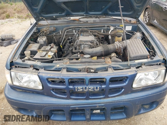 2002 Isuzu Rodeo S with VIN 4S2CK58W124320988, listed as a IAAI auction lot 41921874 with 227,320 mi miles and . Bid and sale history available at DreamBid. Image 10.