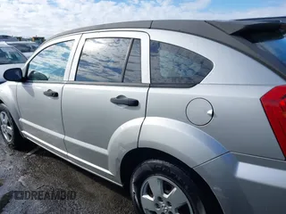 2008 Dodge Caliber SE with VIN 1B3HB28B48D502983, listed as a IAAI auction lot 41429571 with 185,487 mi miles and . Bid and sale history available at DreamBid. Image 14.