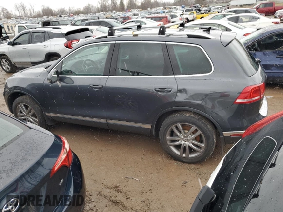 2015 Volkswagen Touareg Sport with VIN WVGEF9BP0FD003335, listed as a Copart auction lot 85151024 with 159,336 mi miles and Clean title. Bid and sale history available at DreamBid. Image 2.
