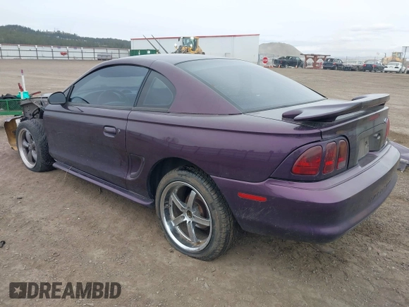 1996 Ford Mustang with VIN 1FALP404XTF174880, listed as a IAAI auction lot 41774122 with 285,302 mi miles. Bid and sale history available at carsss.com. Image 3.