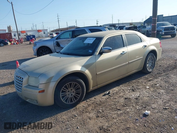 2010 Chrysler 300 Touring with VIN 2C3CA5CV0AH167992, listed as a IAAI auction lot 41985352 with 235,816 mi miles. Bid and sale history available at carsss.com. Image 2.