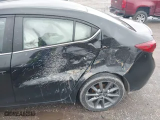 2018 Mazda Mazda3 4-Door Touring with VIN 3MZBN1V35JM243351, listed as a IAAI auction lot 41459525 with 55,765 mi miles. Bid and sale history available at carsss.com. Image 6.