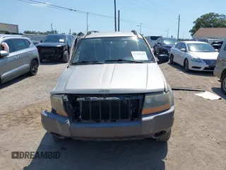 2004 Jeep Grand Cherokee Laredo z VIN 1J4GW48SX4C283922, wystawiony jako IAAI lot #42306869 z przebiegiem 263 812 mil mil oraz . Historia ofert i sprzedaży dostępna na DreamBid. Obrazek 11.