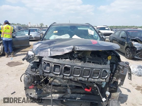 2022 Jeep Compass Trailhawk with VIN 3C4NJDDBXNT157230, listed as a IAAI auction lot 42046292 with Not provided miles and . Bid and sale history available at DreamBid. Image 12.