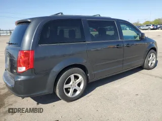 2012 Dodge Grand Caravan SXT with VIN 2C4RDGCG8CR204035, listed as a Copart auction lot 54743005 with 187,533 mi miles and Clean Title. Bid and sale history available at DreamBid. Image 3.