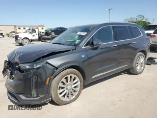 2021 Cadillac XT6 Premium Luxury z VIN 1GYKPDRS0MZ141534, wystawiony jako Copart lot #52801195 z przebiegiem 35 297 mil mil oraz Szkoda całkowita • Salvage title. Historia ofert i sprzedaży dostępna na DreamBid. Obrazek 1.
