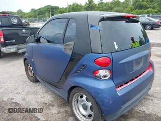 2013 Smart fortwo Pure with VIN WMEEJ3BA6DK664115, listed as a IAAI auction lot 42412198 with 64,522 mi miles and . Bid and sale history available at DreamBid. Image 3.
