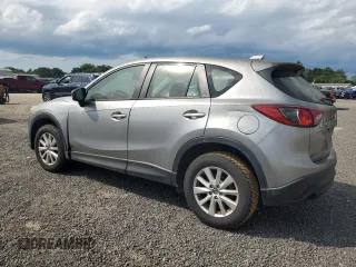 2014 Mazda CX-5 Sport with VIN JM3KE2BE7E0350965, listed as a Copart auction lot 60130195 with 196,072 mi miles and Clean title. Bid and sale history available at DreamBid. Image 2.