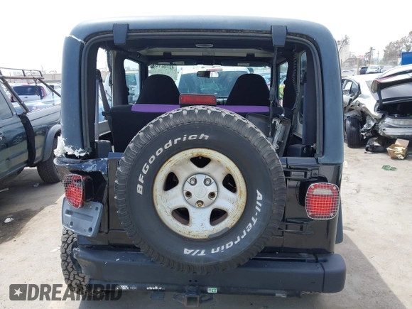 2002 Jeep Wrangler X with VIN 1J4FA39S32P738246, listed as a IAAI auction lot 42106359 with 266,993 mi miles and . Bid and sale history available at DreamBid. Image 16.