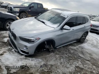 2018 BMW X1 sDrive28i with VIN WBXHU7C32J5H44215, listed as a Copart auction lot 87356474 with 121,828 mi miles and Salvage Title. Bid and sale history available at carsss.com. Image 1.