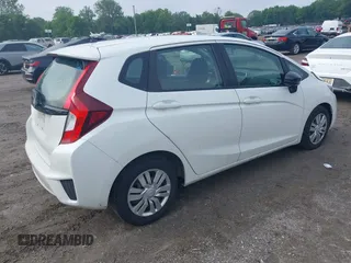 2015 Honda Fit LX with VIN 3HGGK5H51FM752870, listed as a IAAI auction lot 42378020 with 109,698 mi miles and . Bid and sale history available at DreamBid. Image 4.