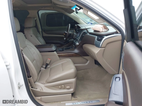 2018 Chevrolet Tahoe LT with VIN 1GNSCBKC5JR323595, listed as a IAAI auction lot 41550552 with 115,697 mi miles. Bid and sale history available at carsss.com. Image 5.