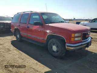 1996 GMC Yukon with VIN 1GKEK13RXTJ743218, listed as a Copart auction lot 70217184 with 256,504 mi miles and Clean Title. Bid and sale history available at carsss.com. Image 4.