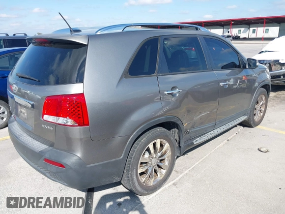 2011 Kia Sorento EX with VIN 5XYKU4A24BG182674, listed as a IAAI auction lot 41490284 with 163,378 mi miles. Bid and sale history available at carsss.com. Image 4.