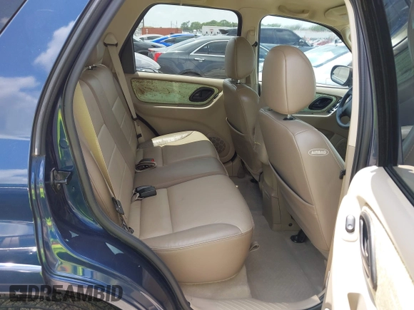 2003 Ford Escape Limited z VIN 1FMCU94163KA63424, wystawiony jako IAAI lot #42737023 z przebiegiem 137 918 mil mil oraz . Historia ofert i sprzedaży dostępna na DreamBid. Obrazek 8.