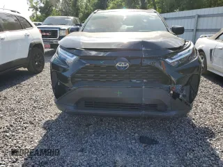 2023 Toyota RAV4 Hybrid LE with VIN JTMLWRFV7PD204946, listed as a Copart auction lot 51330055 with 10,560 mi miles and Salvage Title. Bid and sale history available at carsss.com. Image 5.