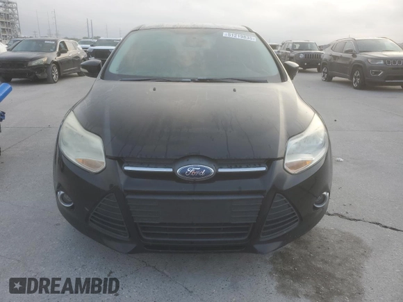 2014 Ford Focus SE with VIN 1FADP3F24EL324006, listed as a Copart auction lot 51219835 with 148,264 mi miles and Salvage Title. Bid and sale history available at carsss.com. Image 5.