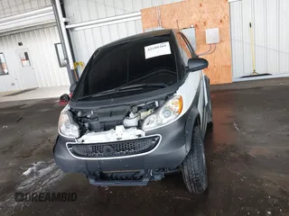 2014 Smart fortwo Pure z VIN WMEEJ3BA4EK737709, wystawiony jako IAAI lot #42105265 z przebiegiem 23 970 mil mil oraz . Historia ofert i sprzedaży dostępna na DreamBid. Obrazek 13.