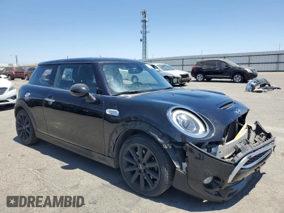 2017 MINI Hardtop Cooper S with VIN WMWXP7C52H2A44625, listed as a Copart auction lot 58011895 with 79,238 mi miles and Salvage title. Bid and sale history available at DreamBid. Image 4.