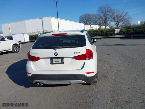 2015 BMW X1 xDrive28i with VIN WBAVL1C50FVY26009, listed as a IAAI auction lot 41495667 with 109,807 mi miles. Bid and sale history available at carsss.com. Image 16.