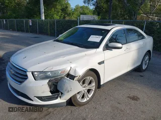 2013 Ford Taurus SEL z VIN 1FAHP2E88DG214441, wystawiony jako IAAI lot #42232859 z przebiegiem 122 388 mil mil oraz . Historia ofert i sprzedaży dostępna na DreamBid. Obrazek 2.