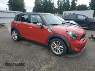 2014 MINI Countryman S with VIN WMWZC3C53EWP25410, listed as a Copart auction lot 62900915 with 122,088 mi miles and Clean title. Bid and sale history available at DreamBid. Image 4.
