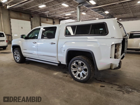 2018 GMC Sierra 1500 Denali z VIN 3GTU2PEJ2JG587157, wystawiony jako Copart lot #58516315 z przebiegiem 88 855 mil mil oraz Szkoda całkowita • Salvage title. Historia ofert i sprzedaży dostępna na DreamBid. Obrazek 2.