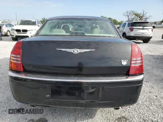2005 Chrysler 300 C with VIN 2C3AA63H15H525775, listed as a Copart auction lot 52018135 with 59,098 mi miles and Salvage Title. Bid and sale history available at DreamBid. Image 6.