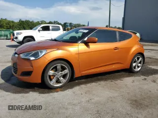 2013 Hyundai Veloster w/Gray Int z VIN KMHTC6AD1DU103219, wystawiony jako Copart lot #60426875 z przebiegiem 135 869 mil mil oraz Szkoda całkowita • Salvage title. Historia ofert i sprzedaży dostępna na DreamBid. Obrazek 1.
