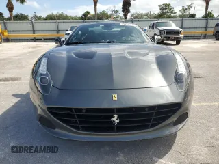 2015 Ferrari California T z VIN ZFF77XJA3F0206563, wystawiony jako Copart lot #73751534 z przebiegiem Nie podano mil oraz Szkody całkowita. Historia ofert i sprzedaży dostępna na DreamBid. Obrazek 5.