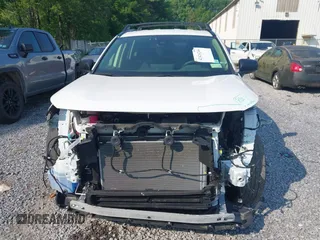 2023 Toyota RAV4 Hybrid LE with VIN JTMLWRFV3PD188020, listed as a IAAI auction lot 42424244 with 69,863 mi miles and . Bid and sale history available at DreamBid. Image 12.