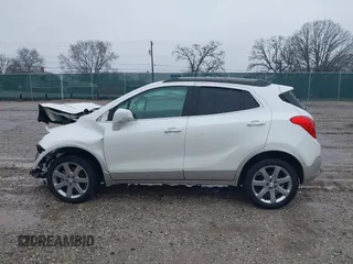 2016 Buick Encore Leather with VIN KL4CJGSB2GB724332, listed as a IAAI auction lot 41547091 with 61,096 mi miles. Bid and sale history available at carsss.com. Image 15.