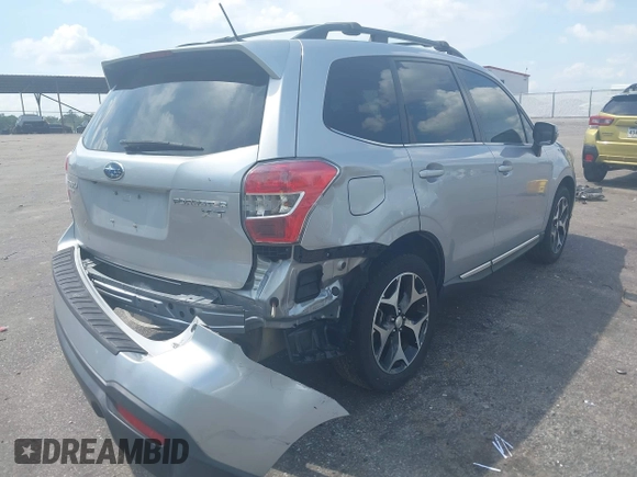 2015 Subaru Forester XT Touring z VIN JF2SJGUC4FH449213, wystawiony jako IAAI lot #42128074 z przebiegiem 112 373 mil mil oraz . Historia ofert i sprzedaży dostępna na DreamBid. Obrazek 4.
