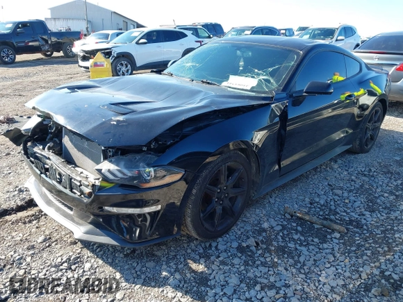 2019 Ford Mustang EcoBoost with VIN 1FA6P8TH8K5173458, listed as a IAAI auction lot 41085251 with 99,260 mi miles and . Bid and sale history available at carsss.com. Image 17.