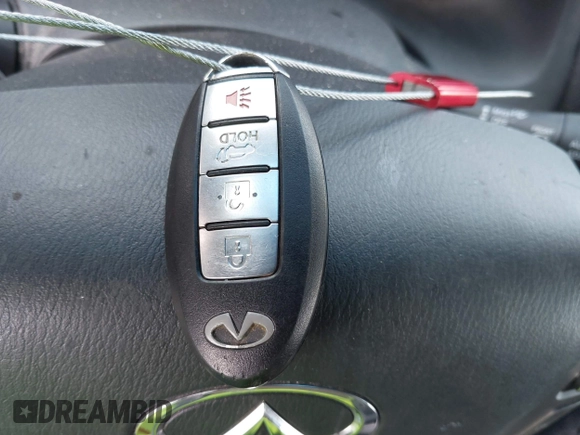 2012 Infiniti QX56 7-passenger z VIN JN8AZ2NF9C9517675, wystawiony jako IAAI lot #42138696 z przebiegiem 129 478 mil mil oraz . Historia ofert i sprzedaży dostępna na DreamBid. Obrazek 11.