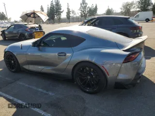 2021 Toyota GR Supra 3.0 with VIN WZ1DB0C04MW034647, listed as a Copart auction lot 73430074 with 68,910 mi miles and Salvage Title. Bid and sale history available at carsss.com. Image 2.