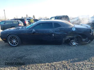 2013 Dodge Challenger R/T z VIN 2C3CDYBT1DH501055, wystawiony jako IAAI lot #41424579 z przebiegiem 156 492 mil mil oraz . Historia ofert i sprzedaży dostępna na DreamBid. Obrazek 14.