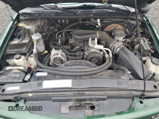 1997 GMC Jimmy SLS with VIN 1GKDT13WXV2563104, listed as a Copart auction lot 86317834 with 121,791 mi miles and Salvage Title. Bid and sale history available at carsss.com. Image 14.