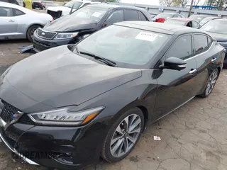 2023 Nissan Maxima Platinum with VIN 1N4AA6FV0PC509933, listed as a IAAI auction lot 41922872 with 11,478 mi miles and . Bid and sale history available at DreamBid. Image 2.
