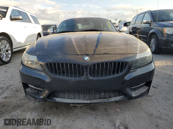 2011 BMW Z4 sDrive35is with VIN WBALM1C56BE633331, listed as a Copart auction lot 73922324 with Not provided miles and Salvage title. Bid and sale history available at DreamBid. Image 5.