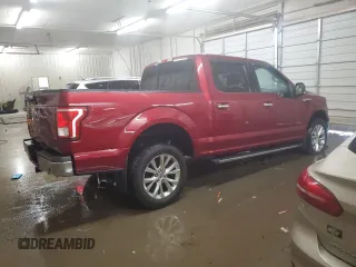 2015 Ford F-150 XLT with VIN 1FTEW1EP7FFC49319, listed as a Copart auction lot 56142895 with 125,052 mi miles and Salvage title. Bid and sale history available at DreamBid. Image 3.