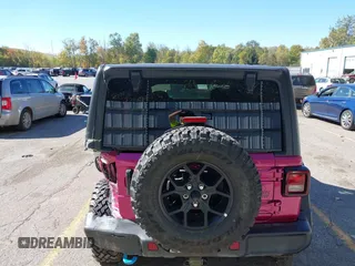 2024 Jeep Wrangler Sport S with VIN 1C4RJXN6XRW323881, listed as a IAAI auction lot 40543759 with 4,440 mi miles and . Bid and sale history available at DreamBid. Image 17.