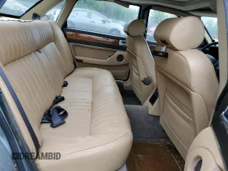 1989 Jaguar XJ with VIN SAJHY1540KC578115, listed as a Copart auction lot 69142274 with Not Provided miles and Clean Title. Bid and sale history available at DreamBid. Image 10.